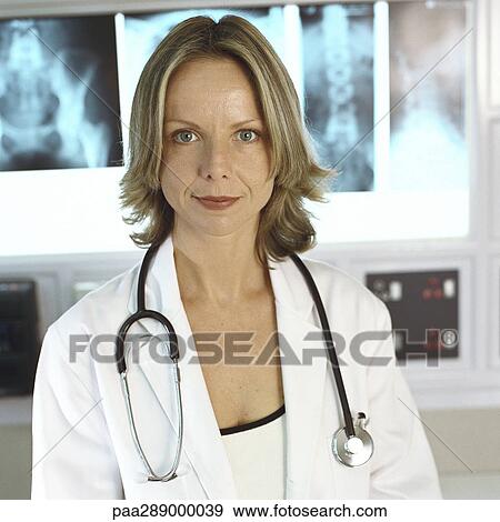 Female doctor in x-ray lab View Large Photo Image Stock Photo - Female doctor in x-ray lab. Fotosearch