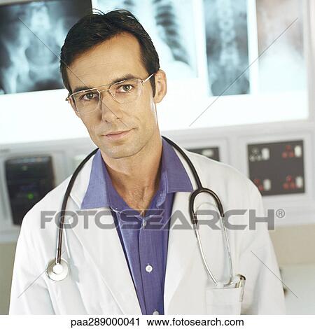 Male doctor in x-ray lab View Large Photo Image Stock Image - Male doctor in x-ray lab. Fotosearch