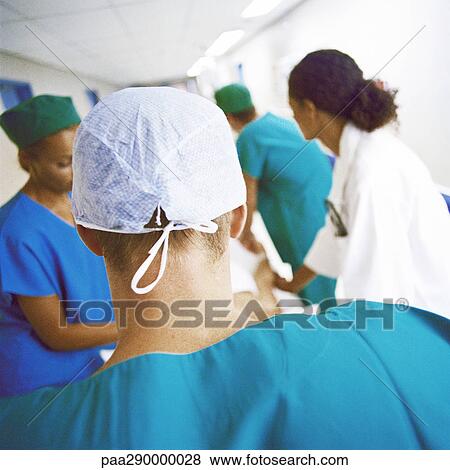 Medical team in hospital corridor View Large Photo Image Stock Photo - Medical team in hospital corridor. Fotosearch