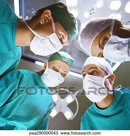 Surgical team, low angle view View Large Photo Image Stock Image - Surgical team, low angle view. Fotosearch