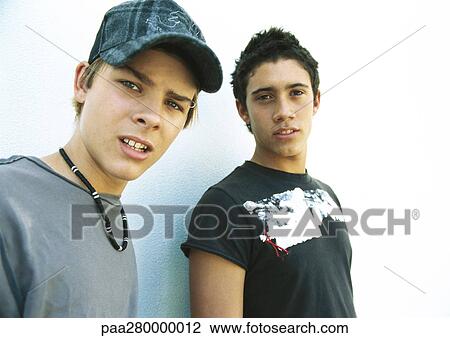 Teenage boys, looking at camera View Large Photo Image Stock Image - Teenage boys, looking at camera. Fotosearch