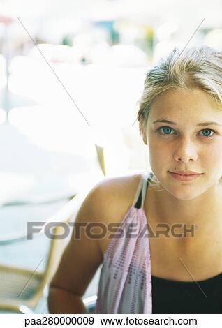 Stock Photo - Teenage girl, looking at camera. Fotosearch