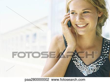 Teenage girl using cell phone View Large Photo Image Stock Image - Teenage girl using cell phone. Fotosearch