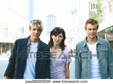 Young people in city setting View Large Photo Image Stock Photo - Young people in city setting. Fotosearch
