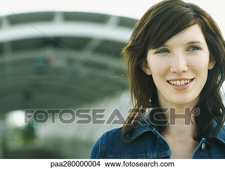 Young woman standing in front of tunnel View Large Photo Image Picture - Young woman standing in front of tunnel. Fotosearch