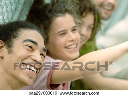 Stock Photo - Group of friends smiling. Fotosearch