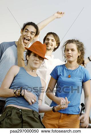 Group of young people playing around View Large Photo Image Stock Image - Group of young people playing around. Fotosearch