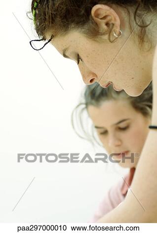 Two young women View Large Photo Image Stock Image - Two young women. Fotosearch