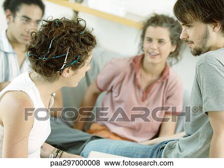 Young people talking View Large Photo Image Stock Photo - Young people talking. Fotosearch