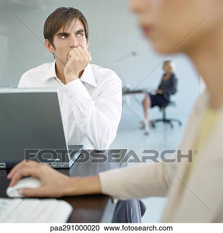 Businesspeople in office View Large Photo Image Stock Image - Businesspeople in office. Fotosearch
