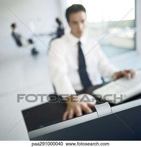 Businesspeople in office View Large Photo Image Stock Image - Businesspeople in office. Fotosearch