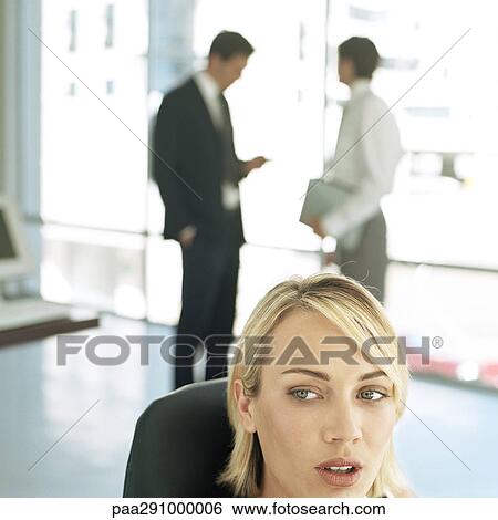 Stock Photograph - Businesspeople in office. Fotosearch