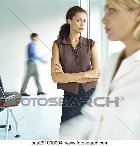 Picture - Businesspeople in workspace. Fotosearch