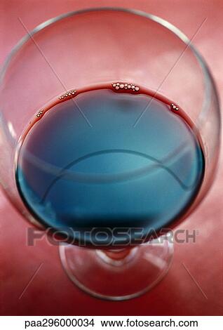 Glass of red wine View Large Photo Image Picture - Glass of red wine. Fotosearch
