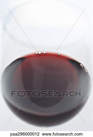 Glass of red wine View Large Photo Image Stock Image - Glass of red wine. Fotosearch