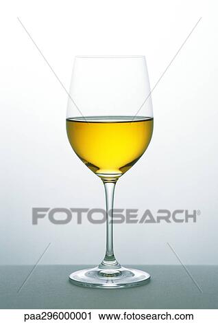 Stock Image - Glass of white wine. Fotosearch
