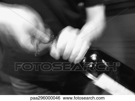 Man uncorking bottle of wine View Large Photo Image Stock Photograph - Man uncorking bottle of wine. Fotosearch