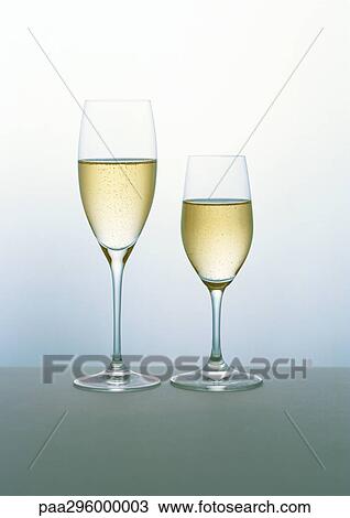 Two flutes of Champagne View Large Photo Image Stock Image - Two flutes of Champagne. Fotosearch