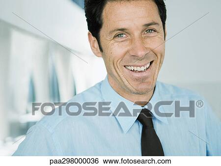 Businessman laughing portrait View Large Photo Image Stock Photograph - Businessman laughing portrait. Fotosearch