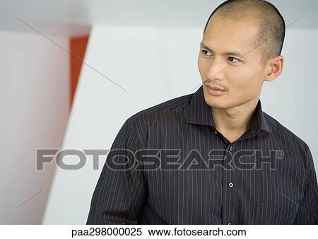 Man wearing button down shirt, portrait View Large Photo Image Stock Photography - Man wearing button down shirt, portrait. Fotosearch
