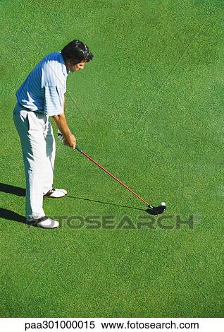 Golfer putting View Large Photo Image Stock Photography - Golfer putting. Fotosearch