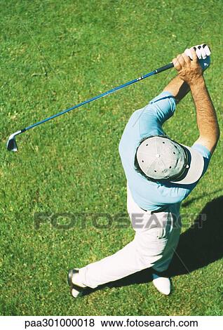 Golfer swinging View Large Photo Image Stock Photo - Golfer swinging. Fotosearch