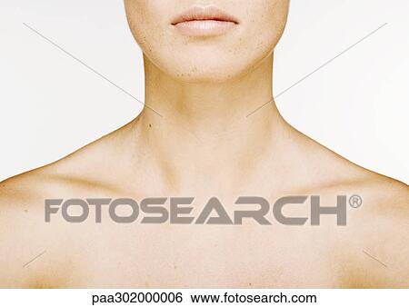 Woman's lower face, neck and bare upper chest View Large Photo Image Stock Photograph - Woman's lower face, neck and bare upper chest. Fotosearch