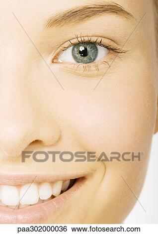 Woman's smiling face, extreme close-up View Large Photo Image Stock Photograph - Woman's smiling face, extreme close-up. Fotosearch