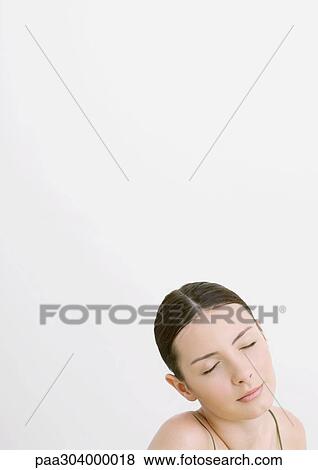 Woman with eyes closed View Large Photo Image Stock Photo - Woman with eyes closed. Fotosearch
