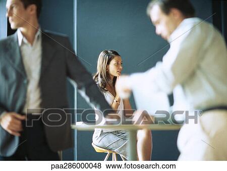 Businesspeople in cafe setting View Large Photo Image Stock Photo - Businesspeople in cafe setting. Fotosearch