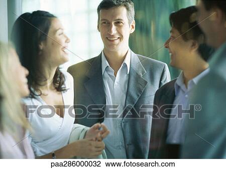 Group of businesspeople smiling View Large Photo Image Stock Image - Group of businesspeople smiling. Fotosearch