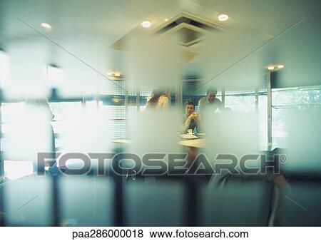 People in conference room, seen through semi-opaque glass wall View Large Photo Image Stock Photo - People in conference room, seen through semi-opaque glass wall. Fotosearch