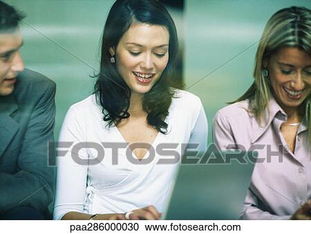 Three businesspeople side by side View Large Photo Image Stock Image - Three businesspeople side by side. Fotosearch
