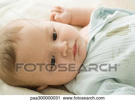 Baby semi-dressed View Large Photo Image Stock Image - Baby semi-dressed. Fotosearch