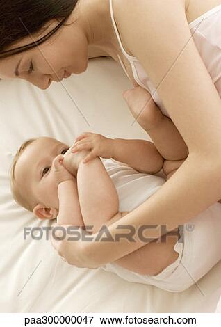 Stock Photo - Mother and baby. Fotosearch