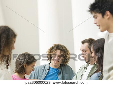 Group of students talking together View Large Photo Image Stock Image - Group of students talking together. Fotosearch