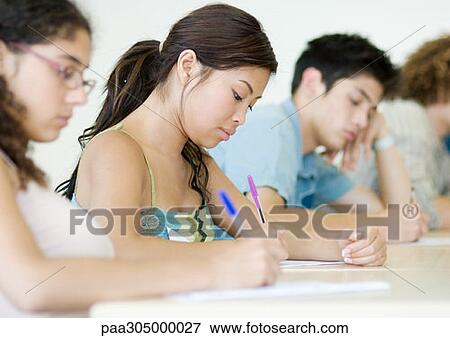 Students taking test in class View Large Photo Image Stock Photo - Students taking test in class. Fotosearch