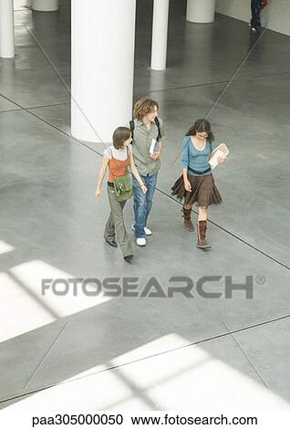 Students walking through lobby View Large Photo Image Stock Image - Students walking through lobby. Fotosearch