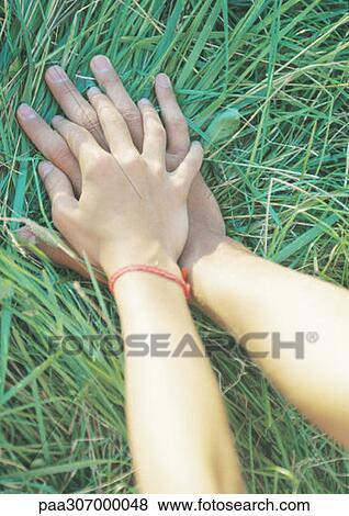Holding hands View Large Photo Image Stock Photo - Holding hands. Fotosearch