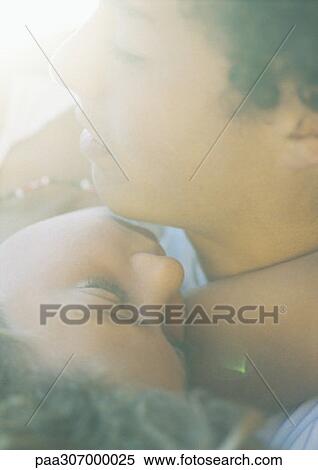 Young couple sleeping, close-up of faces View Large Photo Image Stock Photography - Young couple sleeping, close-up of faces. Fotosearch