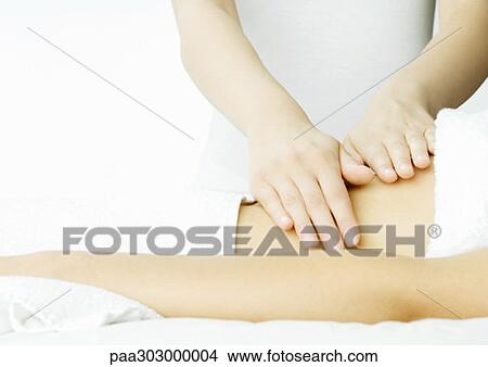Stomach massage View Large Photo Image Picture - Stomach massage. Fotosearch