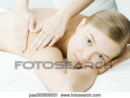 Woman having massage View Large Photo Image Stock Image - Woman having massage. Fotosearch