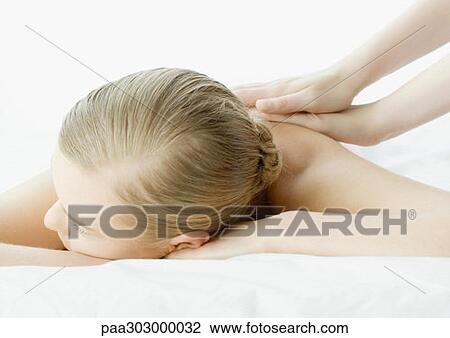 Stock Image - Woman having massage. Fotosearch