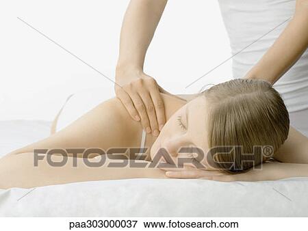 Woman having massage View Large Photo Image Stock Photo - Woman having massage. Fotosearch