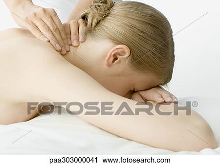 Woman having neck massage View Large Photo Image Stock Image - Woman having neck massage. Fotosearch