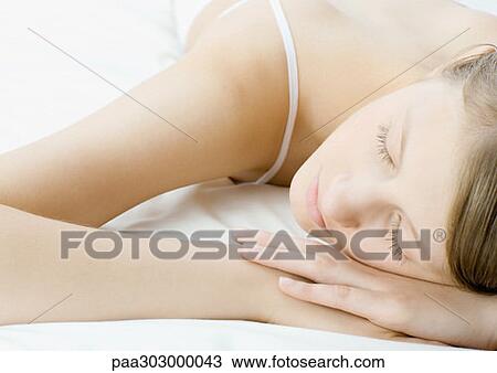 Stock Image - Woman sleeping. Fotosearch