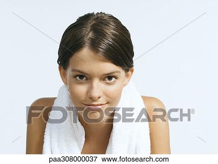 Woman with towel around neck View Large Photo Image Stock Photo - Woman with towel around neck. Fotosearch