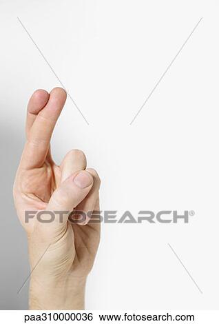 Crossing fingers View Large Photo Image Stock Photograph - Crossing fingers. Fotosearch