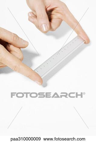 Fingers holding ruler View Large Photo Image Stock Photo - Fingers holding ruler. Fotosearch
