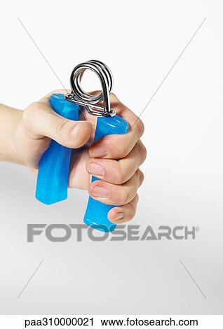 Stock Image - Hand holding handgrip. Fotosearch